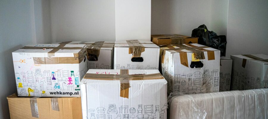 brown cardboard boxes on brown wooden table
